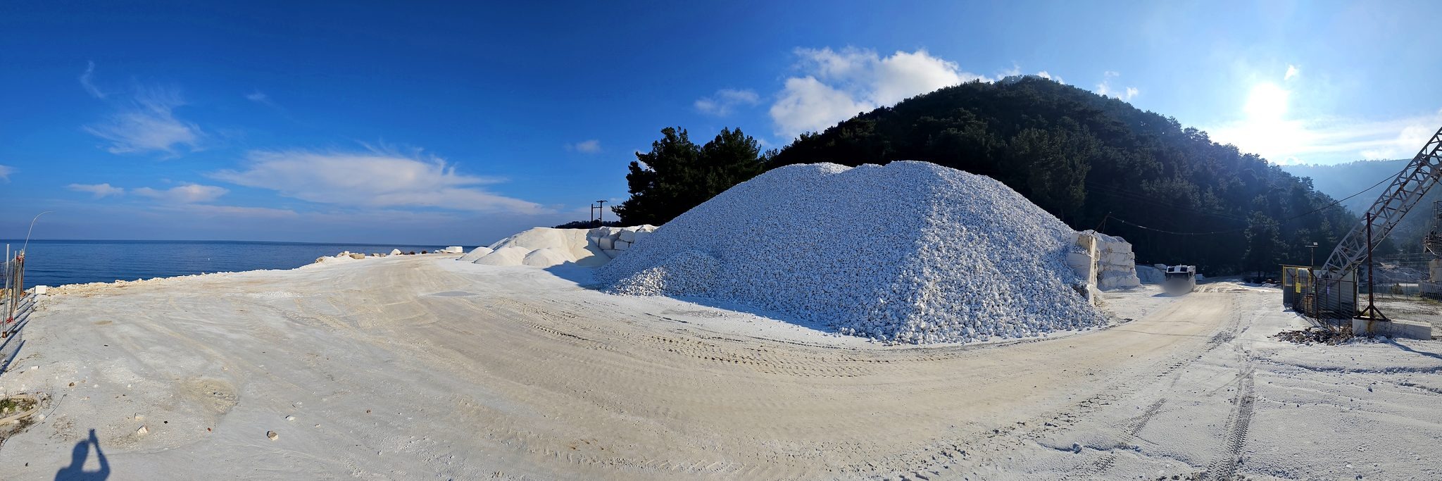Bright white marble quarry above the coast