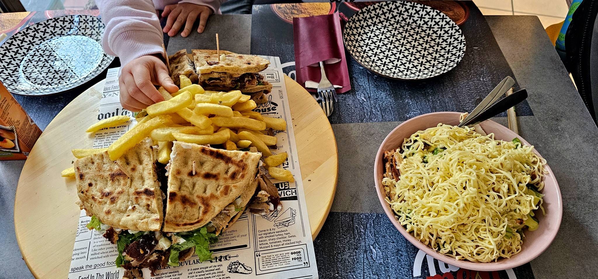Souvlaki wraps, fries and salad