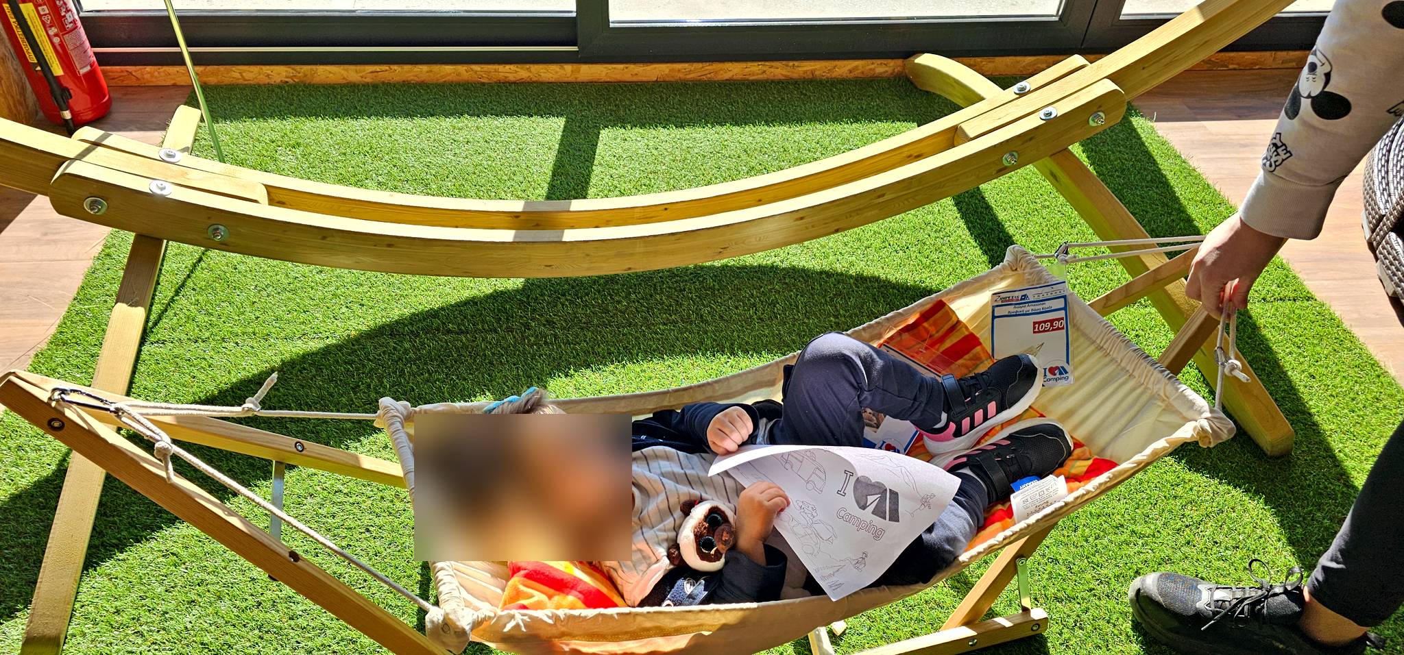 Kids testing a hammock on display