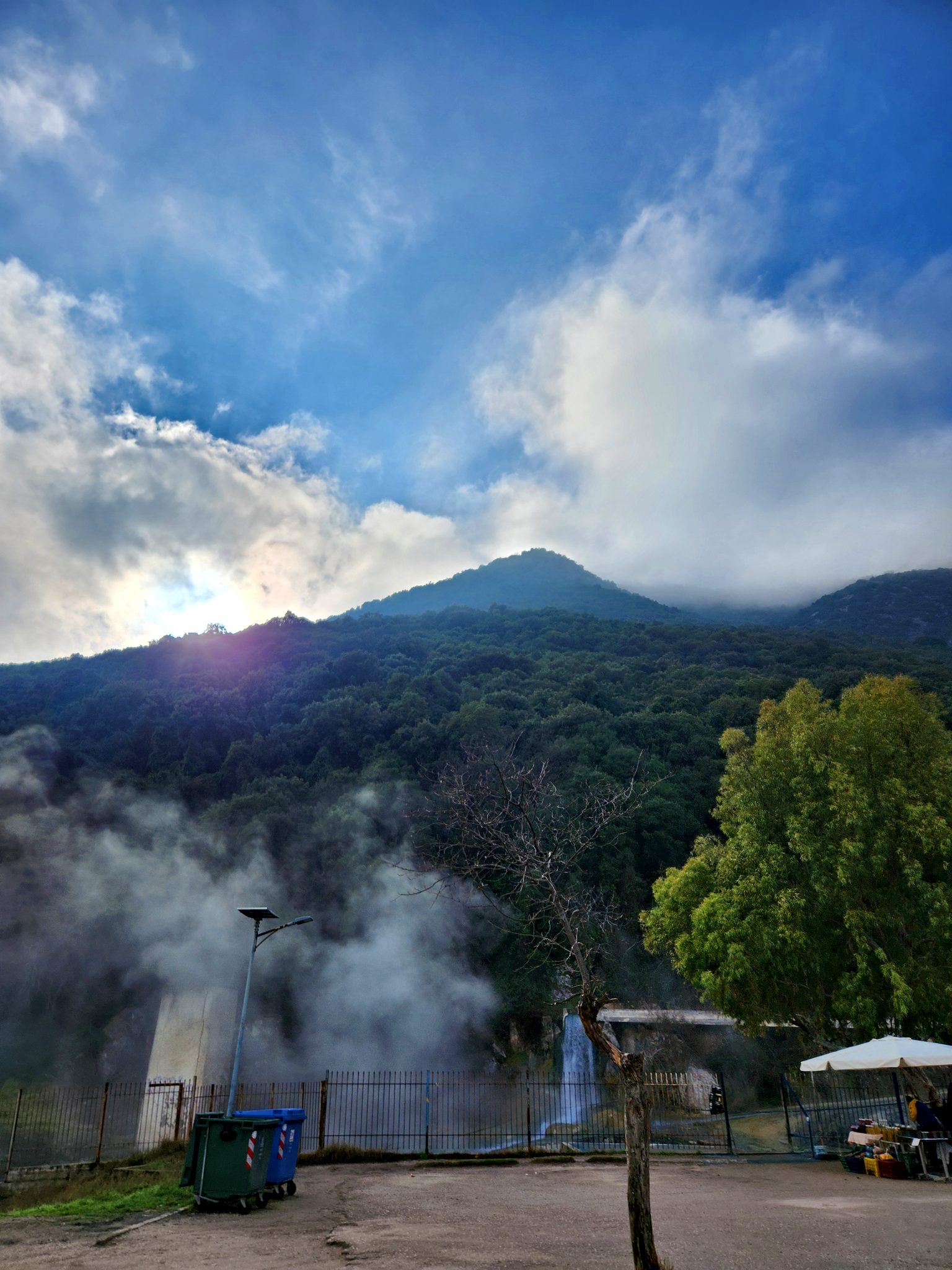 Steam rising across the road as we arrived